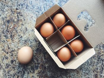 Directly above shot of eggs in box