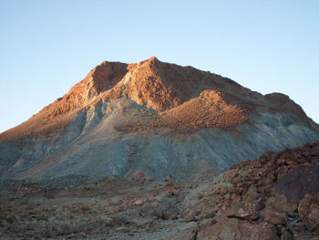 Scenic view of rocky mountains against clear sky