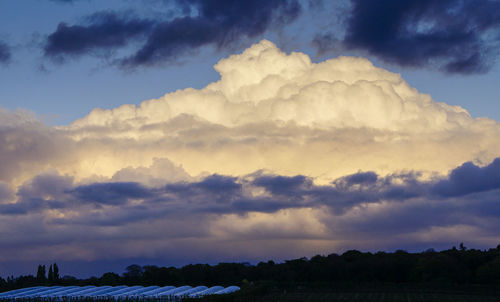 Scenic view of dramatic sky over landscape