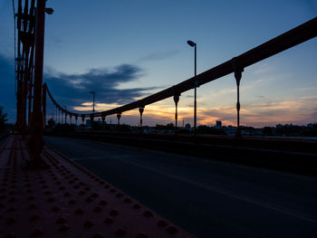 View of bridge against cloudy sky