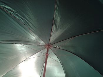 Low angle view of umbrella on ceiling