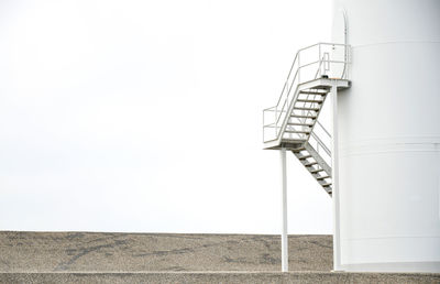 Low angle view of staircase against clear sky