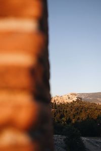 Close-up of rock against clear sky