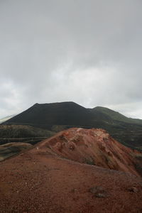 Scenic view of volcanic landscape against sky