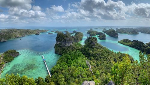 High angle view of puncak harapan against sky in misool island raja ampat indonesia 