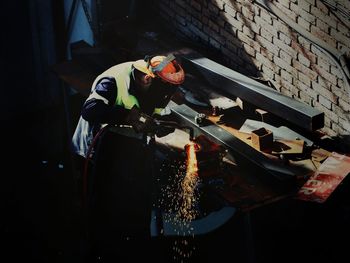 High angle view of illuminated fire