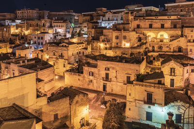 High angle view of illuminated buildings in town