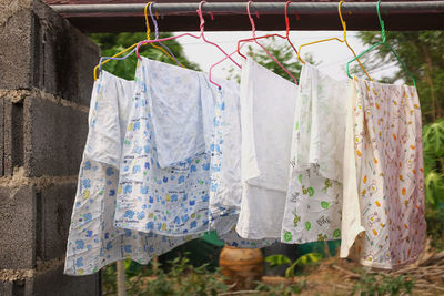 White and soft baby cloth diapers or stack baby cotton on a clothesline