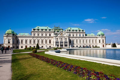 Facade of historic building against blue sky