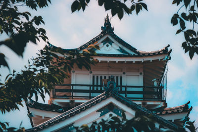 Low angle view of traditional building against sky