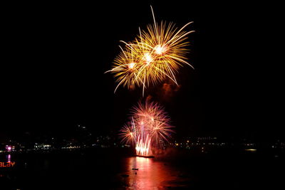 Firework display at night