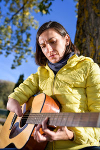 Young man playing guitar