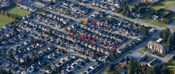 High angle view of street amidst buildings in city