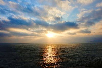 Scenic view of sea at sunset