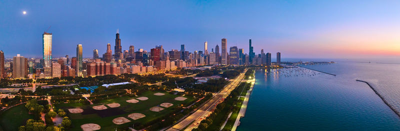 High angle view of city at sunset