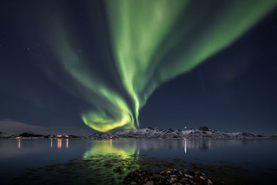 Scenic view of sea against sky at night