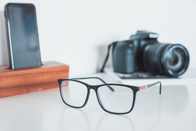 Close-up of camera on table