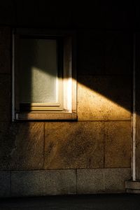 Sunlight falling on window of house