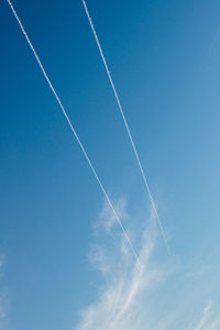 Low angle view of vapor trail in sky