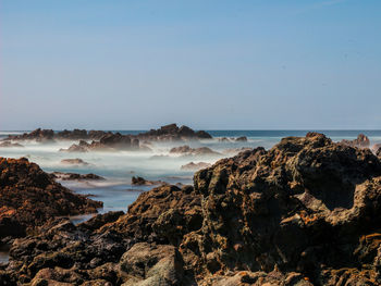 Scenic view of sea against clear sky