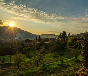 Scenic view of landscape against sky during sunset