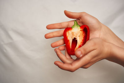 Close-up of woman holding apple