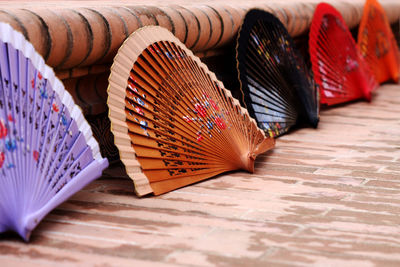 Close-up of paper fan on roof