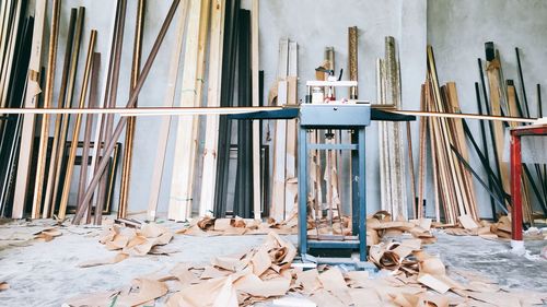 Close-up of chairs on table