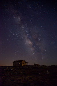 Low angle view of building against sky at night