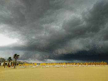 Scenic view of dramatic sky over beach
