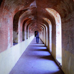 Full length of woman walking in corridor