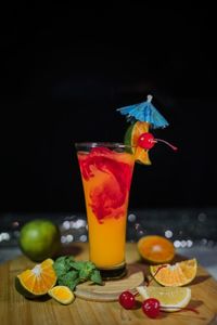 Fruits in glass on table