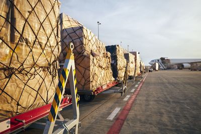 View of cargo on airport against sky