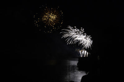 Firework display at night