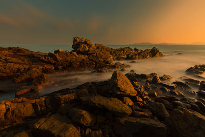 Scenic view of sea against sky during sunset