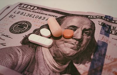 Close-up of coins on table