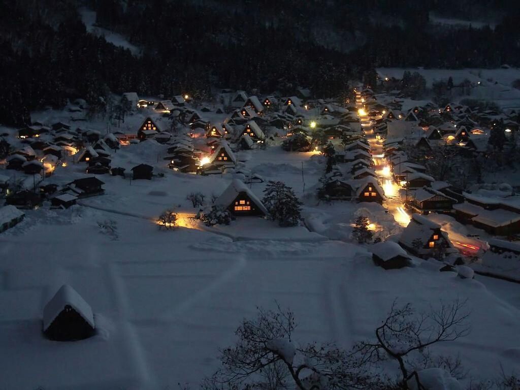 snow, winter, season, cold temperature, high angle view, water, reflection, night, illuminated, tree, nature, weather, transportation, outdoors, street, flying, road, building exterior, no people, car