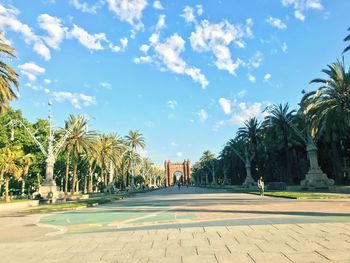 View of palm trees against sky