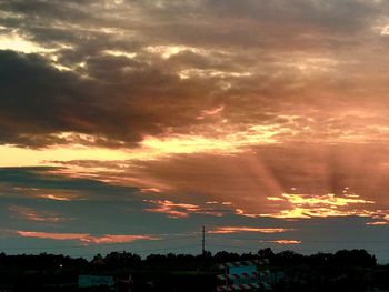 Scenic view of dramatic sky during sunset