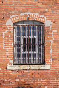 Abandoned prison window and bars