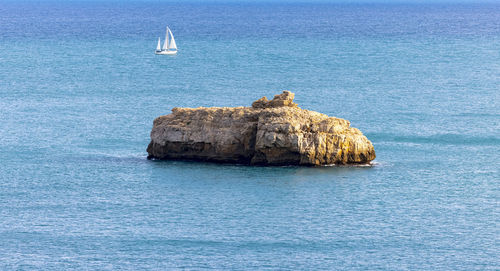 Scenic view of rock formation in sea