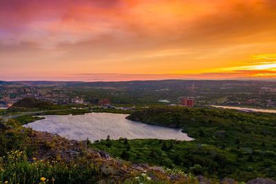 High angle view of city at sunset