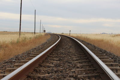 Railroad tracks against sky