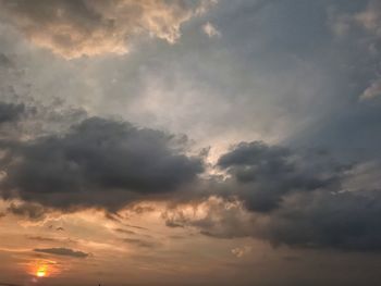 Low angle view of clouds in sky during sunset