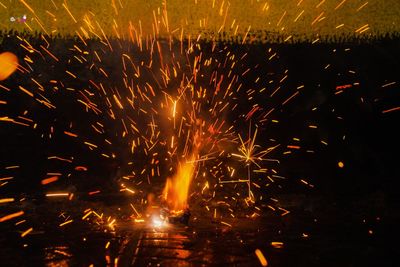 Firework display at night