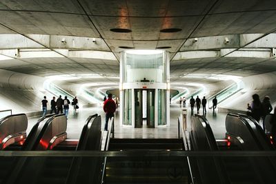 High angle view of people on escalator at subway station