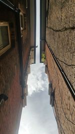 Low angle view of tall buildings against sky