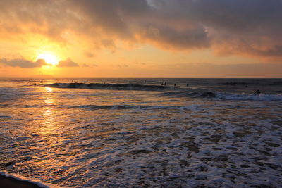 Scenic view of sea at sunset