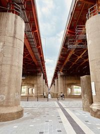 View of bridge against cloudy sky