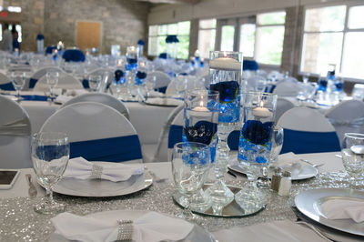 High angle view of glasses on table in restaurant